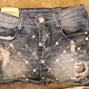 Denim mini skirt with diamonds